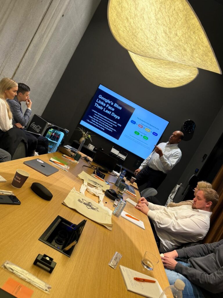 Thomas Anglero Explaining An Ai Concept To A Leadership Audience