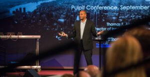 Thomas Anglero Taking Questions From The Audience During An Ai Keynote