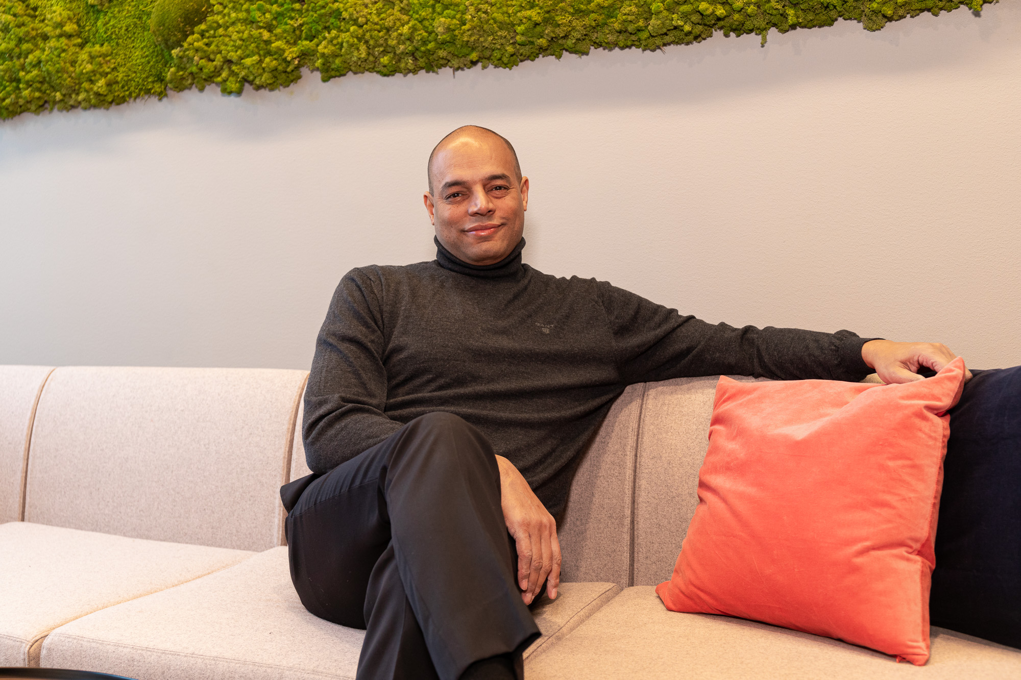 Thomas Anglero, seated and at ease in conversation.
