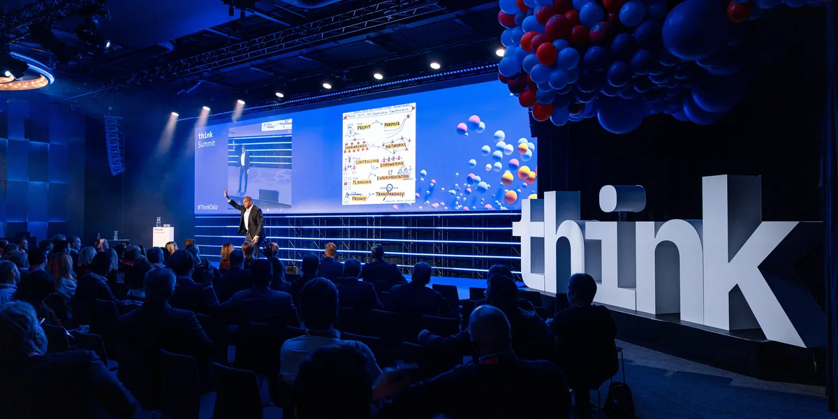 Thomas Anglero delivering a keynote on stage